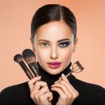 portrait-of-a-girl-with-tools-for-making-makeup-ne-5X38TYW.jpg